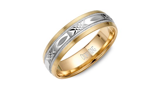 a men’s wedding band featuring mixed metals and intricate details