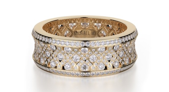 a large, lavishly designed gold ring featuring a multitude of diamonds