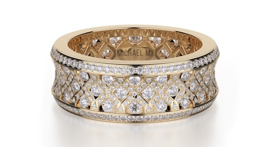 a large, lavishly designed gold ring featuring a multitude of diamonds